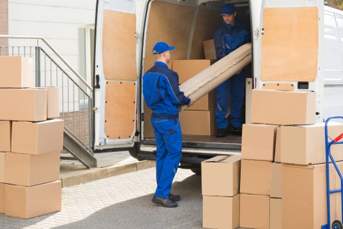 Office relocation planning in Shoreditch with boxes and furniture