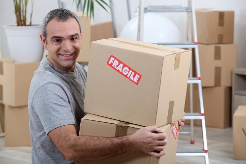 Shoreditch Man And Van loading recyclable household items for an eco-friendly move