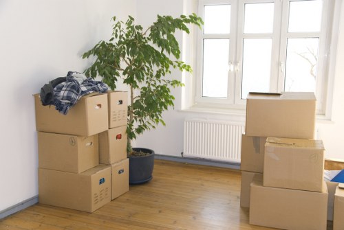 Packed office equipment ready for transport during a Shoreditch move
