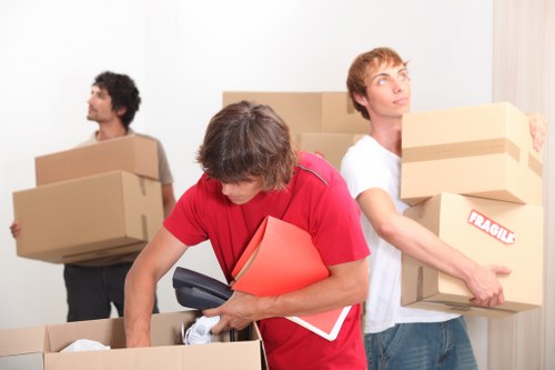 Loading boxes and furniture into a van for a Shoreditch move