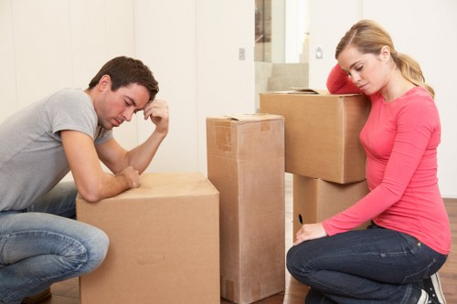 A moving team organising labeled boxes during a Shoreditch relocation