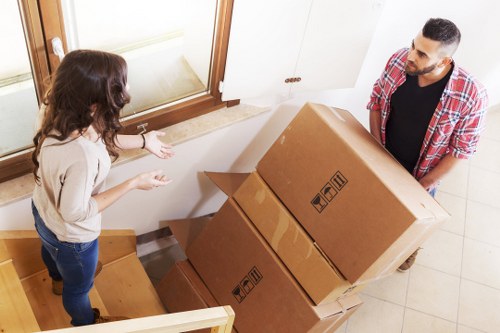 Packing boxes and furniture ready for a Shoreditch moving truck