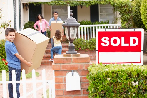 Packing household items carefully for a Shoreditch relocation