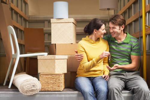 Professional movers handling furniture during a Shoreditch house removal